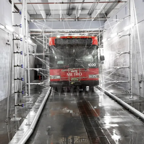 Bus Wash System with High-Pressure Pre-Soak and Rinse Stages