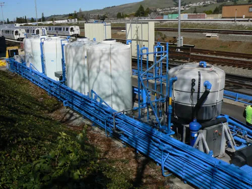 Outdoor Rail Transit Wash System with Chemical Tanks and Supply Lines